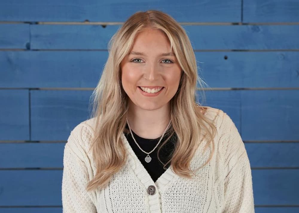 emma-gibbons- content writer smiling at camera 